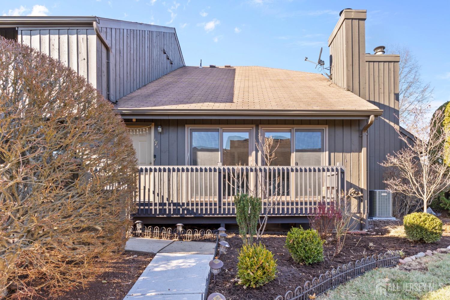 171 Westgate Drive Edison, NJ 08820 - Photo 3 of 49 a view of a house with a deck