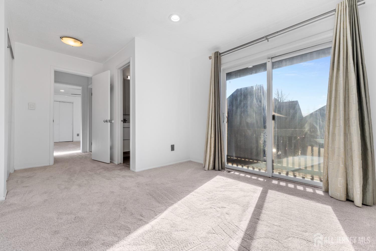 171 Westgate Drive Edison, NJ 08820 - Photo 39 of 49 a view of a room with a large mirror