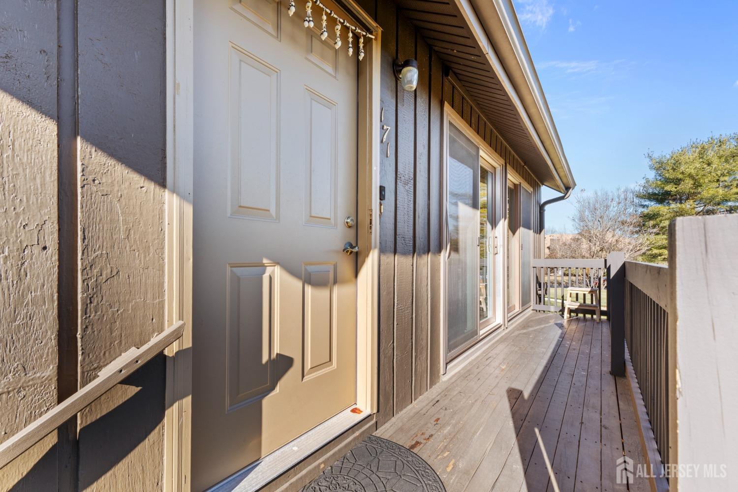 171 Westgate Drive Edison, NJ 08820 - Photo 4 of 49 a view of entryway and hall with wooden floor