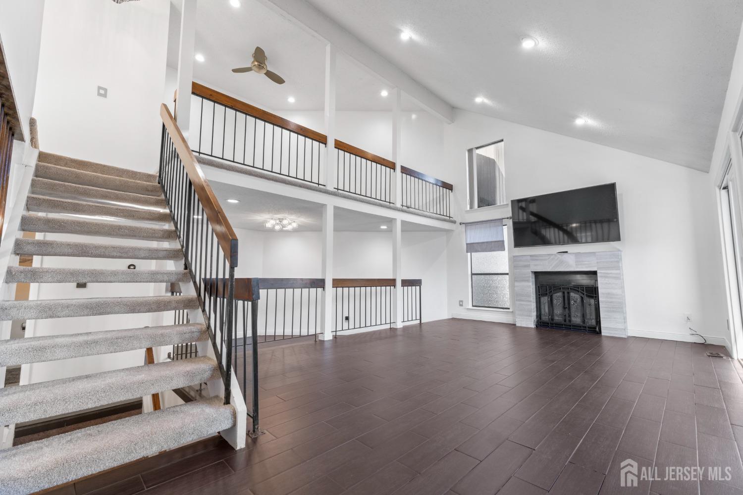 171 Westgate Drive Edison, NJ 08820 - Photo 7 of 49 a view of entryway and hall with wooden floor