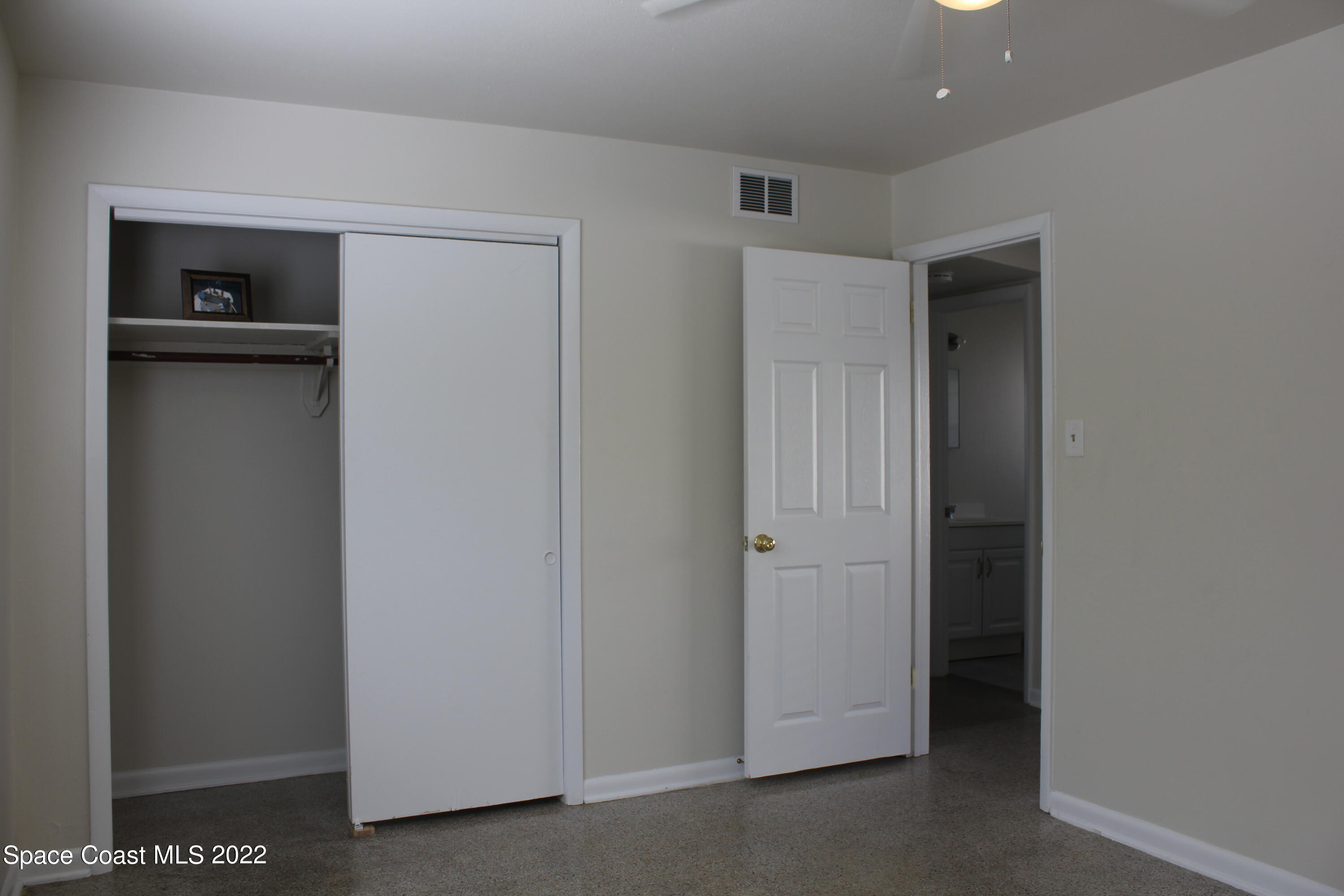 651 Palm Drive, Unit C2 Satellite Beach, FL 32937 - Photo 5 of 13 a view of an empty room