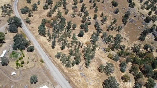 a view of snow on a road