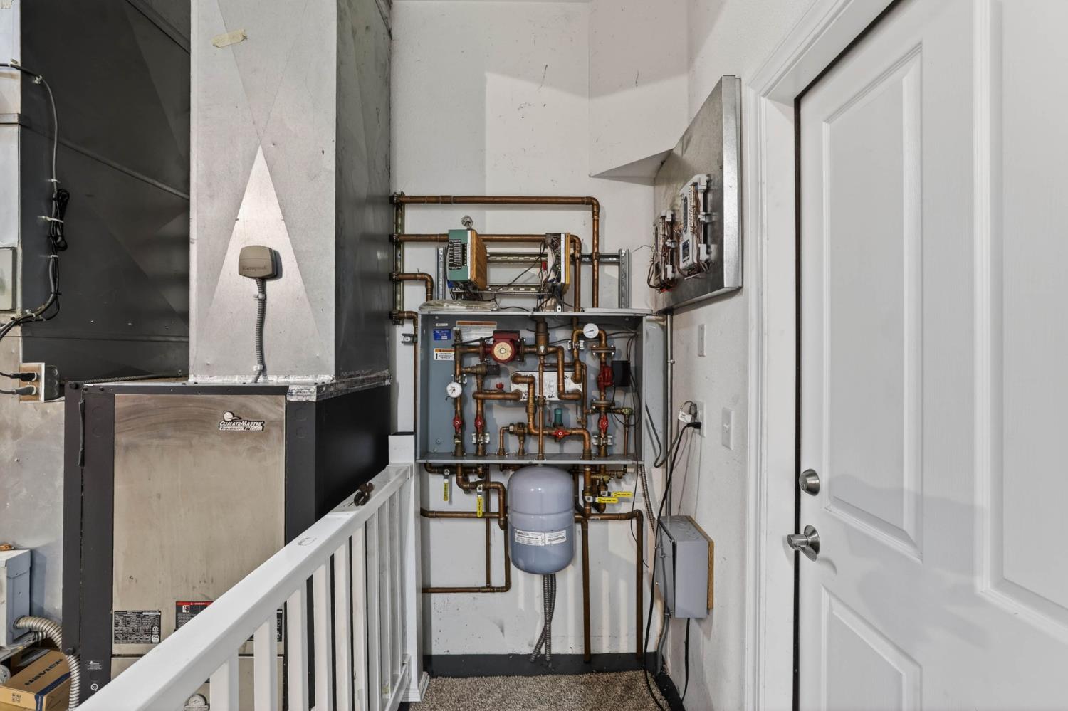 7021 Horseshoe Bar Road Loomis, CA 95650 - Photo 43 of 77 a view of a hallway with wooden floor and staircase