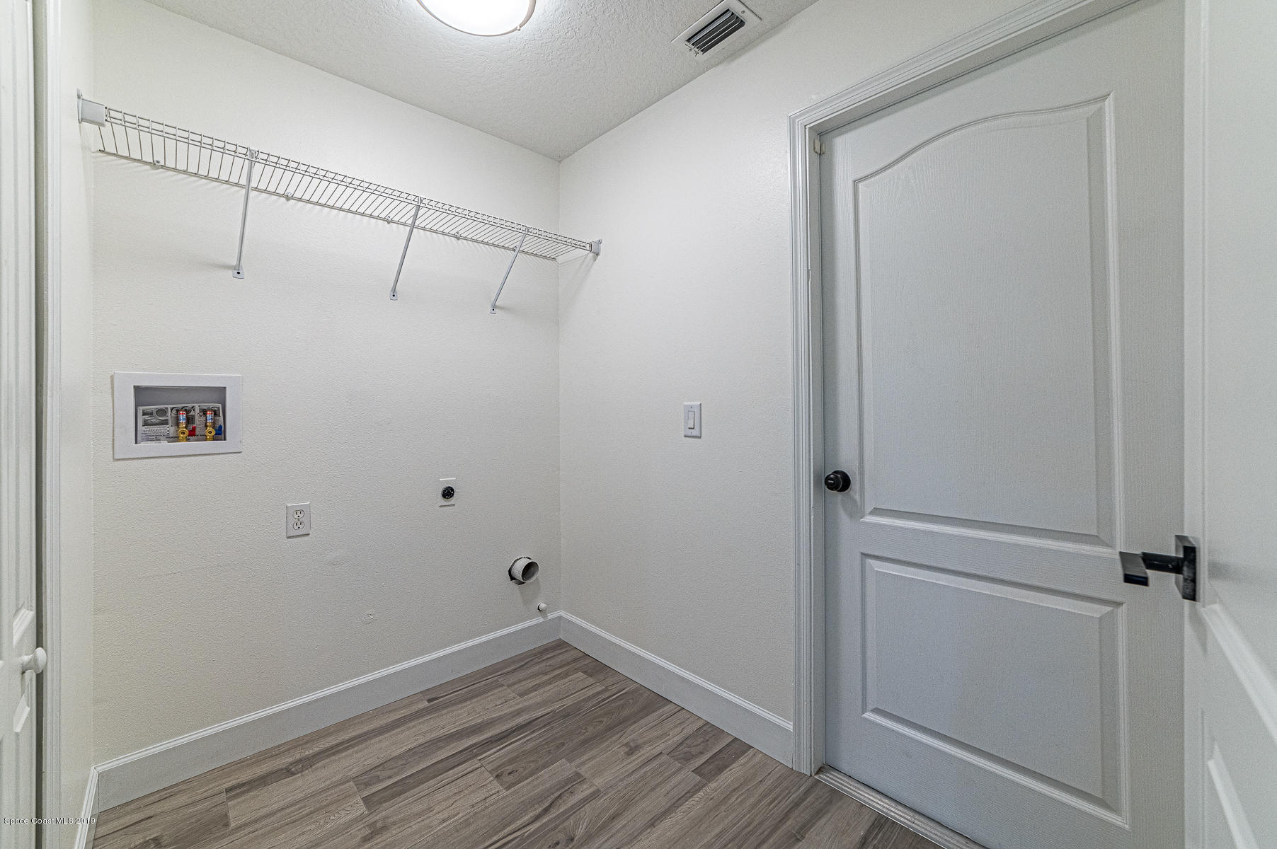 1222 Winding Meadows Road Rockledge, FL 32955 - Photo 16 of 40 Laundry Room