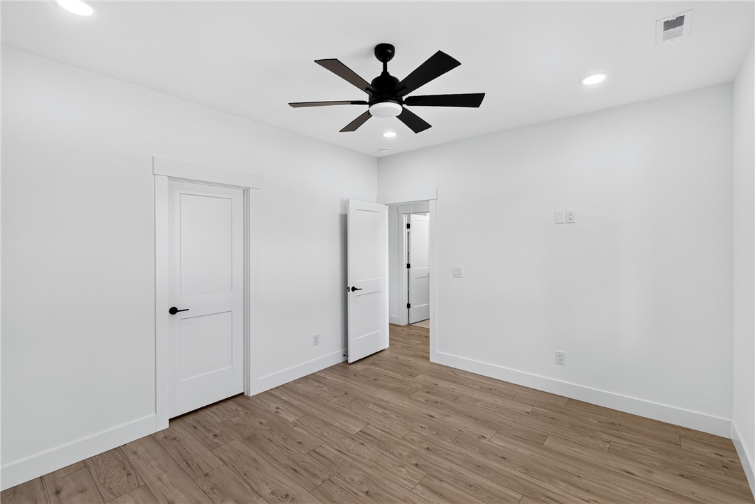 416 Blume Road Anderson, SC 29625 - Photo 18 of 29 Natural wood flooring complements the bright, inviting walls, perfect for serene living.