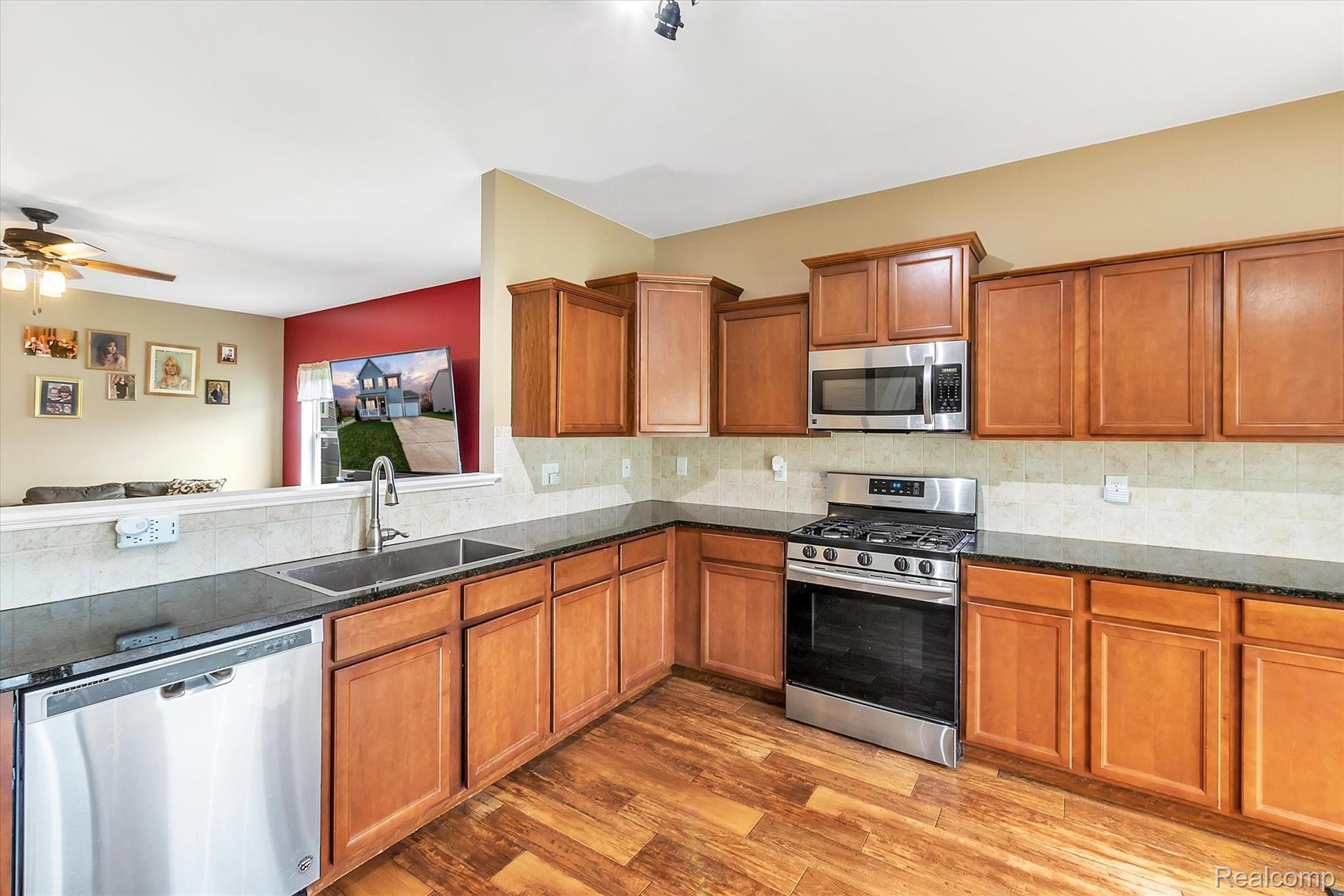 749 Dewars Street Howell, MI 48843 - Photo 12 of 39 View of kitchen featuring stainless steel appliances