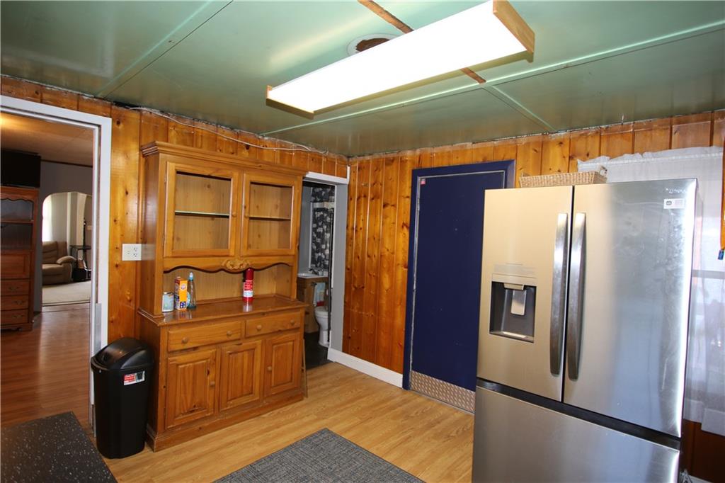 102 10th Street Monongahela, PA 15063 - Photo 13 of 31 a kitchen with stainless steel appliances granite countertop a refrigerator and a stove