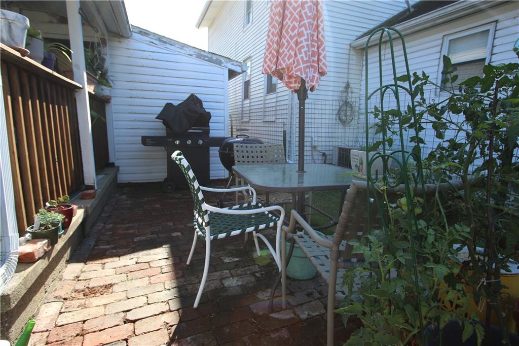 102 10th Street Monongahela, PA 15063 - Photo 23 of 31 a backyard of a house with table and chairs