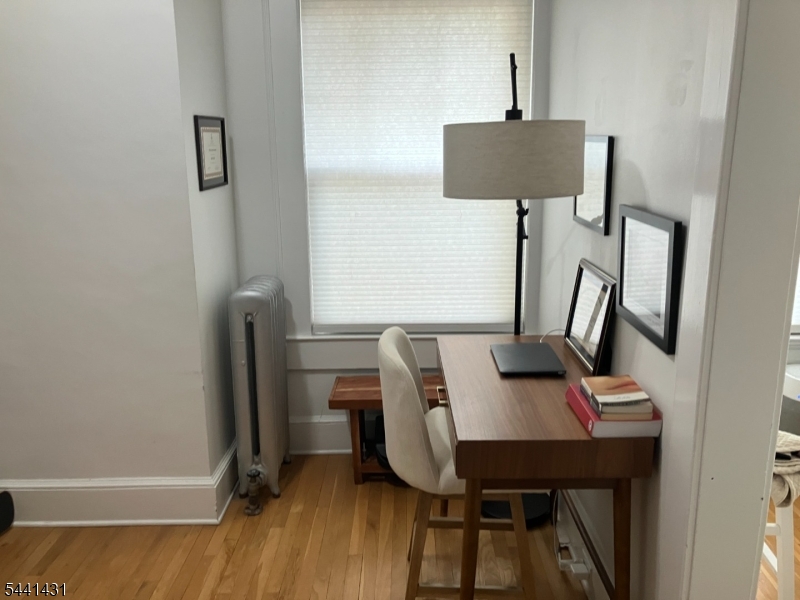 306 Springfield Avenue, Unit 1 Summit, NJ 07901 - Photo 15 of 17 a view of workspace with lounge chair