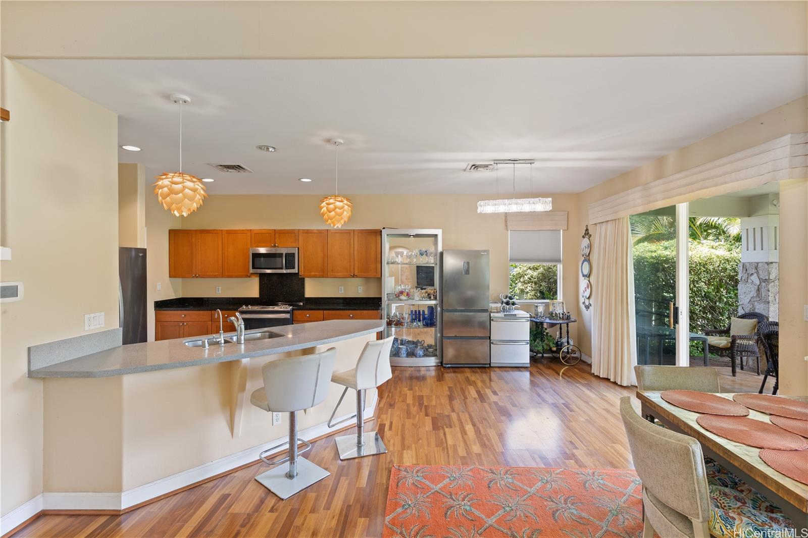 92-1015 Koio Drive, Unit S52 Kapolei, HI 96707 - Photo 11 of 18 a living room with furniture and a large window