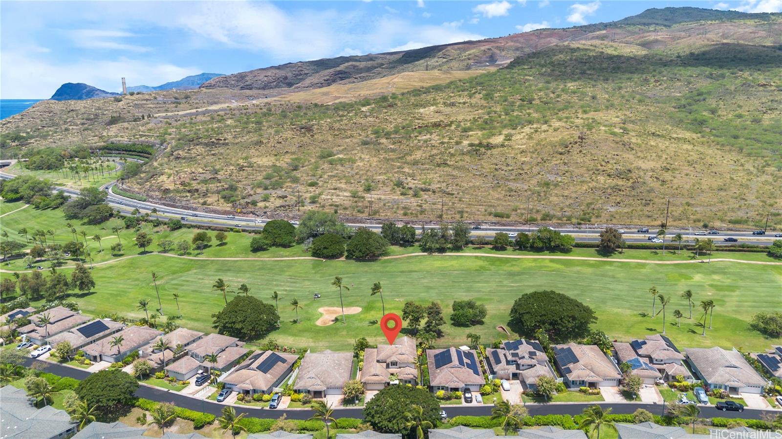92-1015 Koio Drive, Unit S52 Kapolei, HI 96707 - Photo 4 of 18 a view of an outdoor space and yard