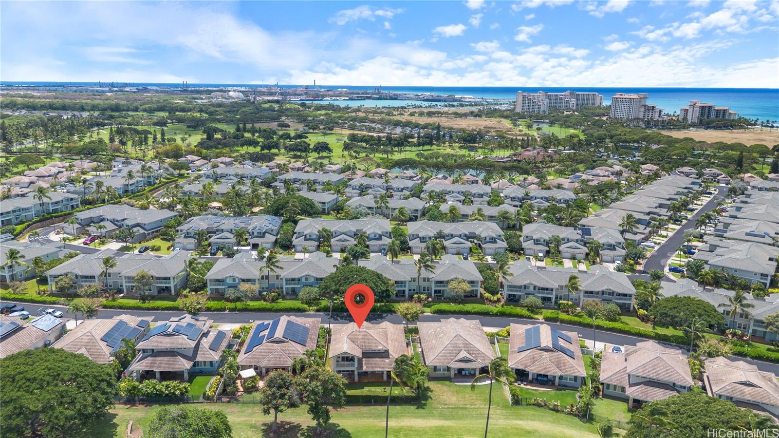 92-1015 Koio Drive, Unit S52 Kapolei, HI 96707 - Photo 5 of 18 an aerial view of a city with lots of residential buildings ocean and mountain view in back