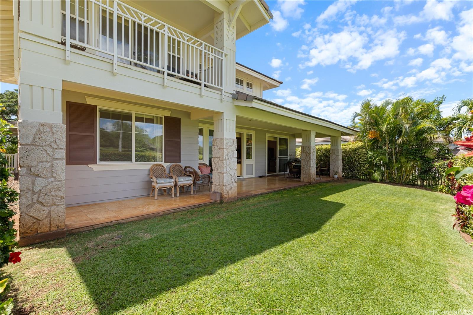 92-1015 Koio Drive, Unit S52 Kapolei, HI 96707 - Photo 6 of 18 a view of a house with backyard porch and sitting area