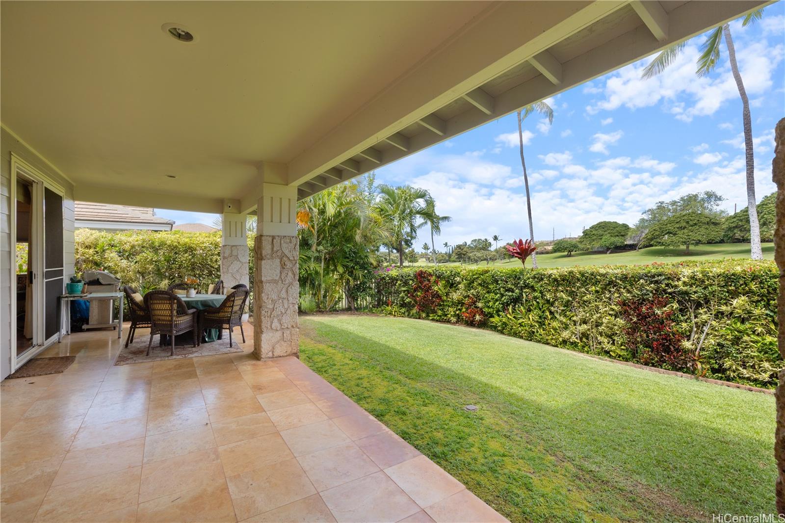 92-1015 Koio Drive, Unit S52 Kapolei, HI 96707 - Photo 7 of 18 a garden view with a sitting space
