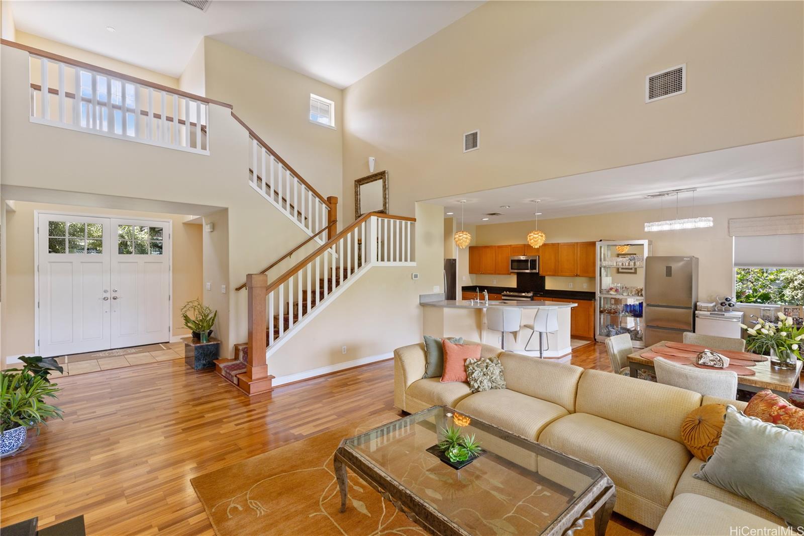 92-1015 Koio Drive, Unit S52 Kapolei, HI 96707 - Photo 10 of 18 a living room with furniture and wooden floor