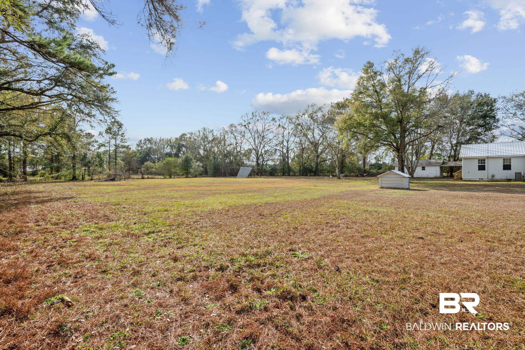 13461 Tom Gaston Road Mobile, AL 36695 - Photo 7 of 41 View of green lawn