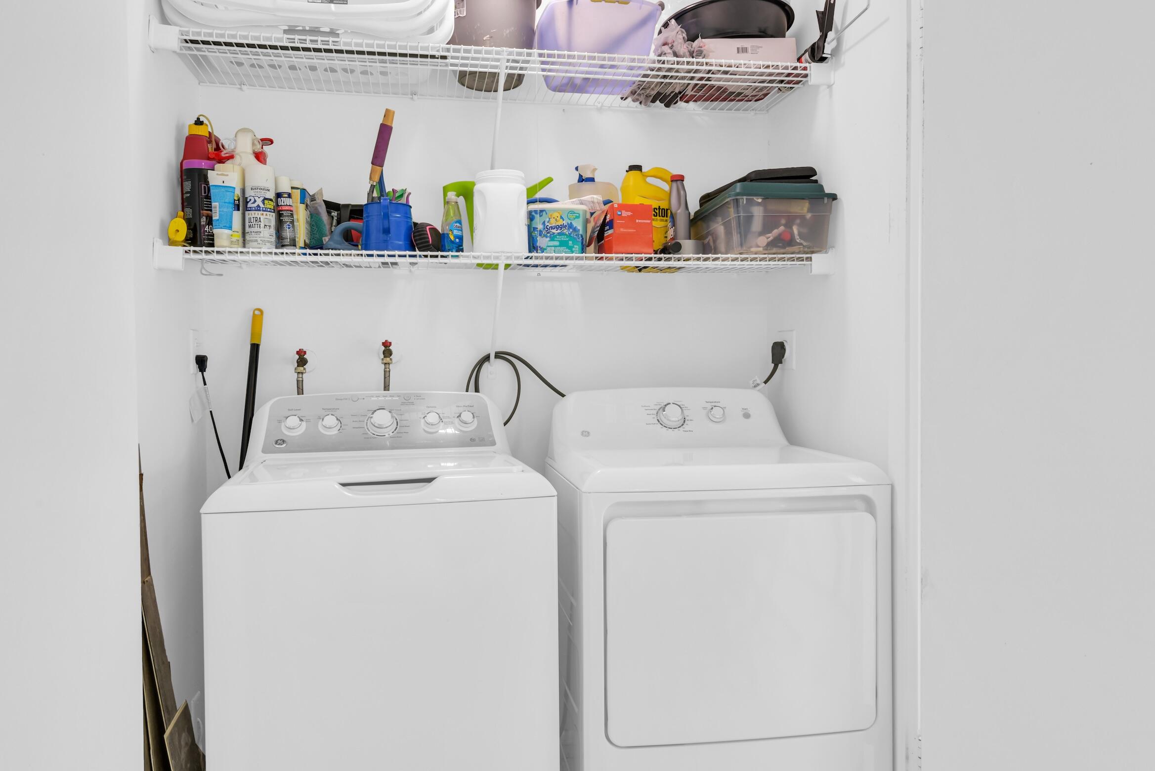 9260 Southwest 61st Way, Unit D Boca Raton, FL 33428 - Photo 24 of 38 a utility room with dryer and washer
