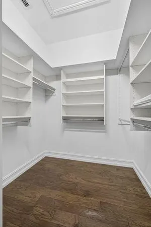 a view of an empty walk in closet