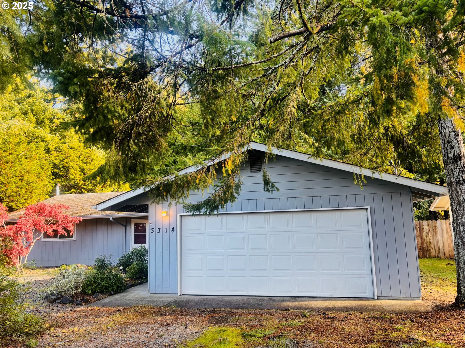 3314 Munsel Lake Road Florence, OR 97439 - Photo 1 of 29 a small pool with a tree in the background