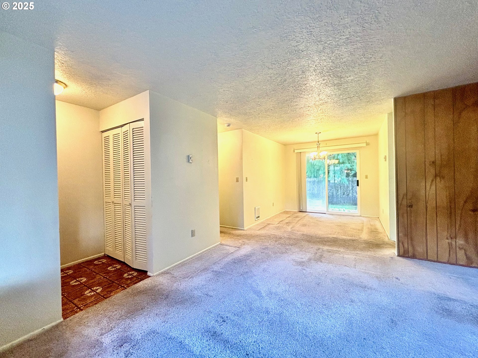 3314 Munsel Lake Road Florence, OR 97439 - Photo 13 of 29 an empty room with windows and closet