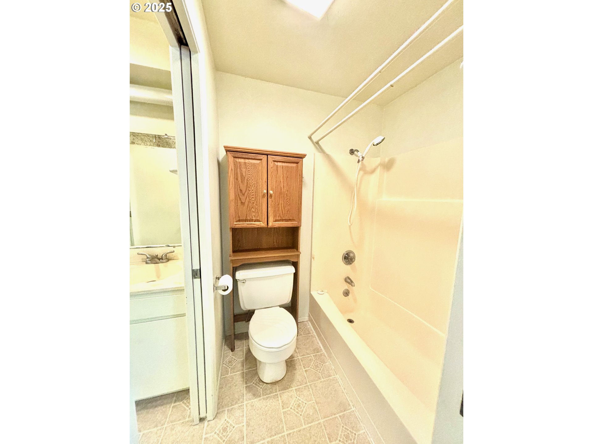 3314 Munsel Lake Road Florence, OR 97439 - Photo 19 of 29 a bathroom with a granite countertop bathtub shower sink mirror and toilet