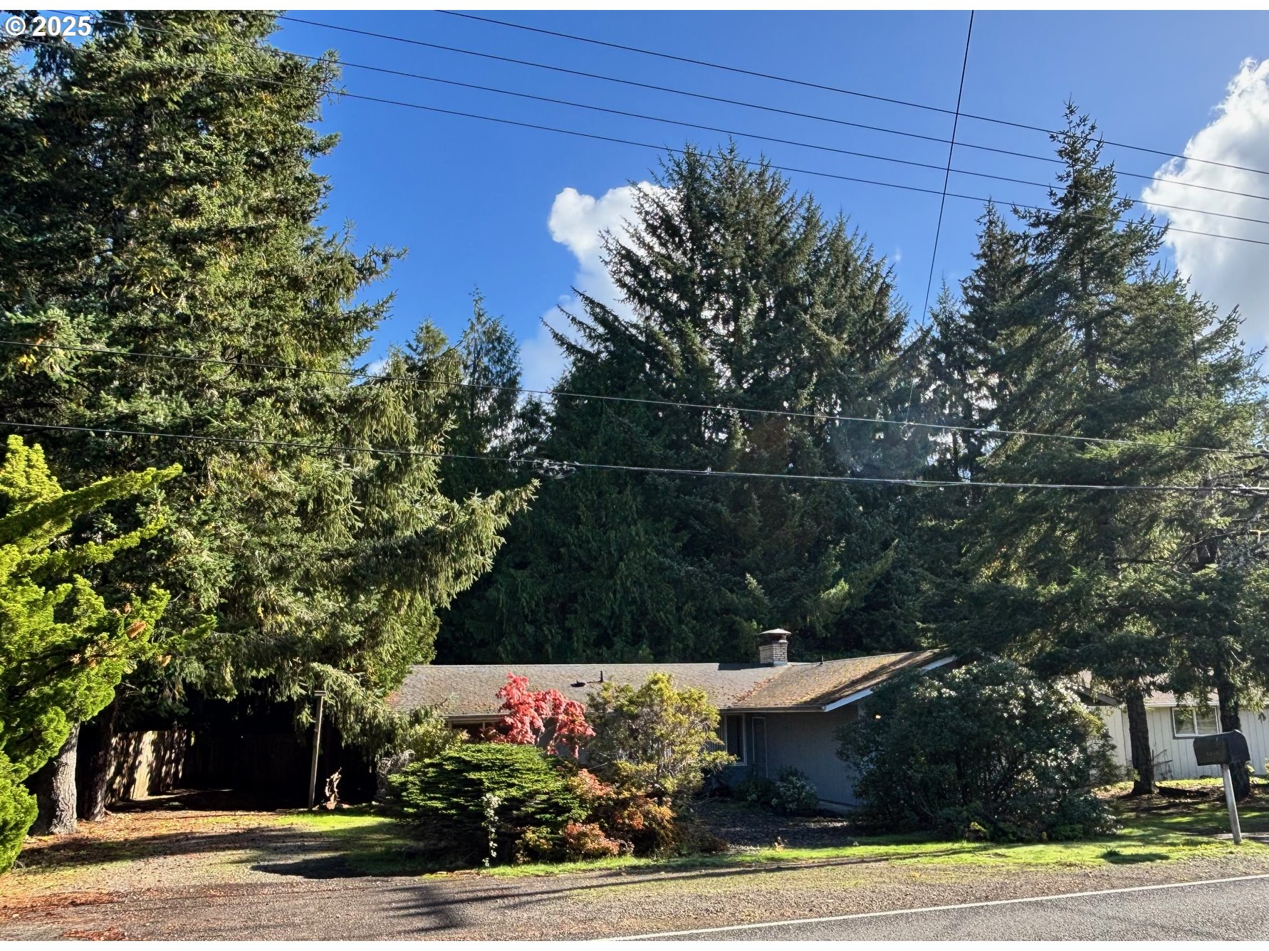 3314 Munsel Lake Road Florence, OR 97439 - Photo 2 of 29 a view of a fountain in the middle of a yard