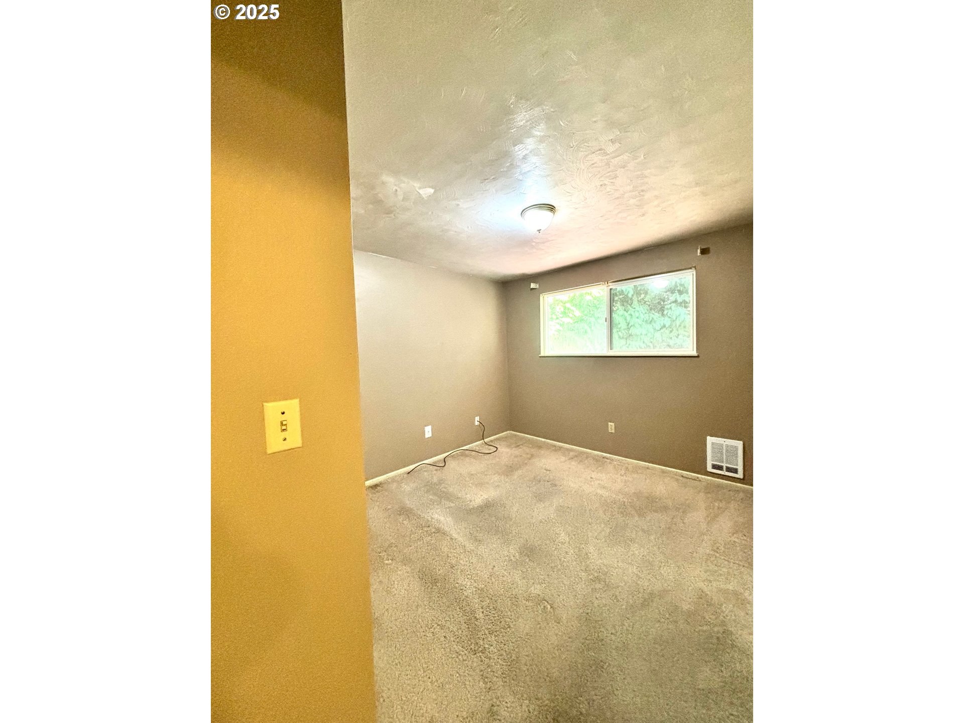 3314 Munsel Lake Road Florence, OR 97439 - Photo 22 of 29 a view of an empty room with a window