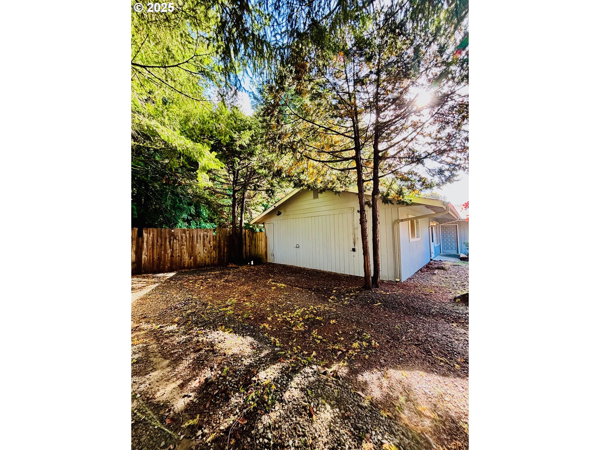 3314 Munsel Lake Road Florence, OR 97439 - Photo 4 of 29 a backyard of a house