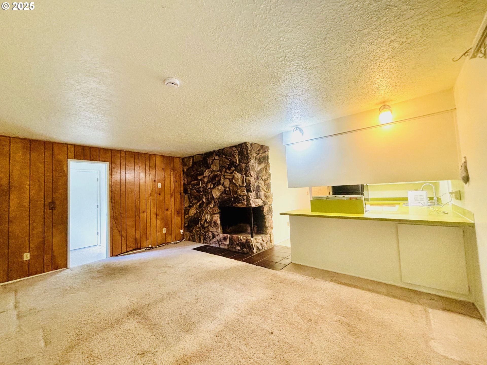 3314 Munsel Lake Road Florence, OR 97439 - Photo 10 of 29 a view of a livingroom with furniture and a window