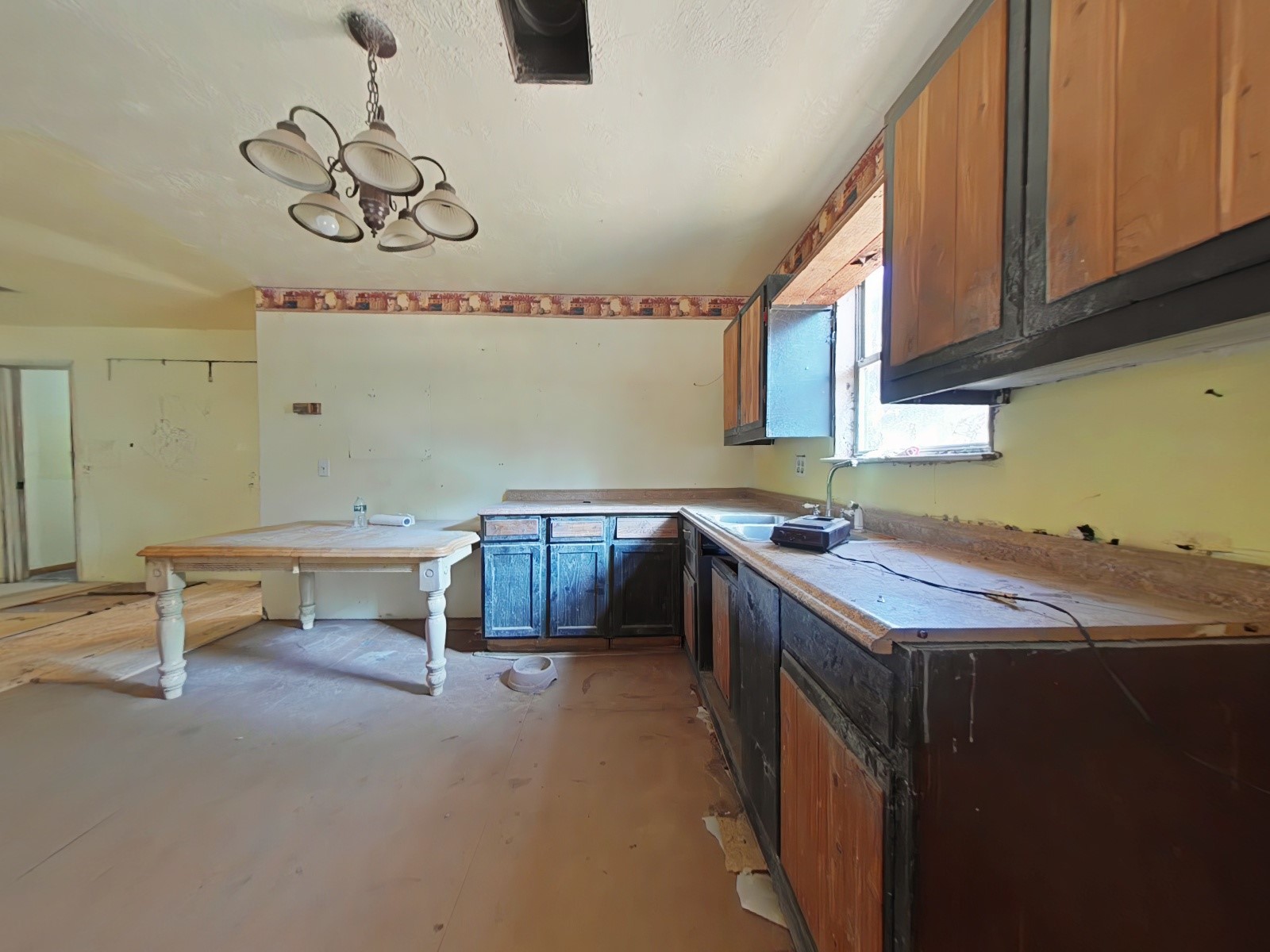1705 Spring Ridge Road Coldspring, TX 77331 - Photo 11 of 26 a kitchen with a sink and a stove