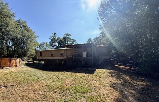1705 Spring Ridge Road Coldspring, TX 77331 - Photo 3 of 26 a view of outdoor space and yard