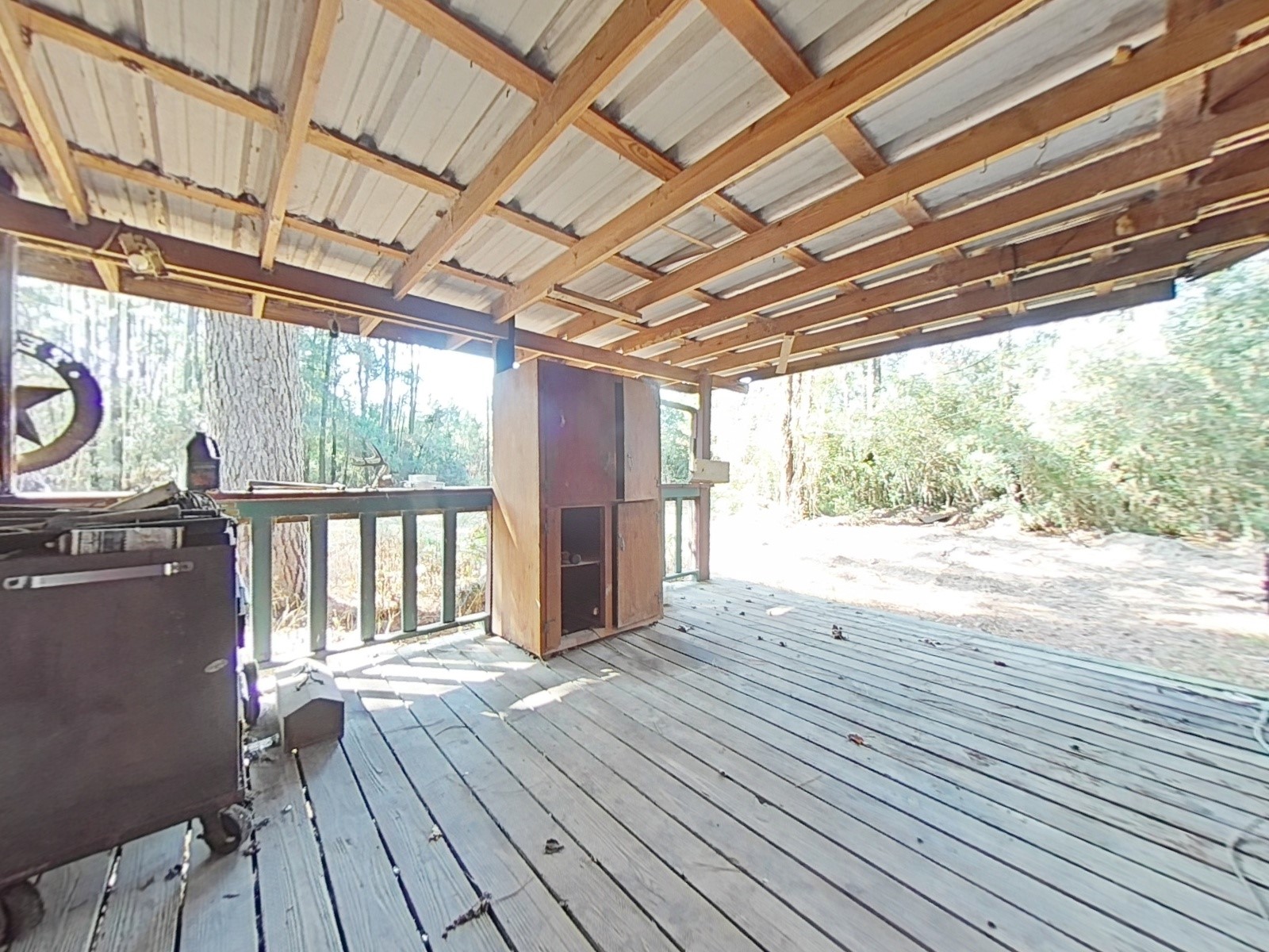 1705 Spring Ridge Road Coldspring, TX 77331 - Photo 9 of 26 a view of outdoor space with wooden floor