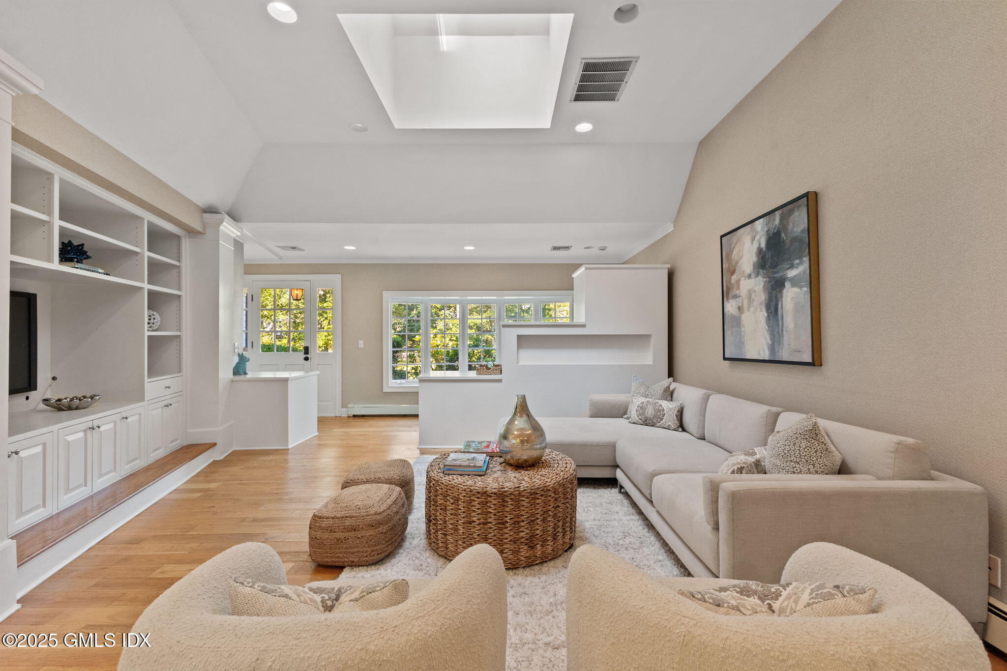177 Indian Head Road Riverside, CT 06878 - Photo 6 of 25 a living room with furniture and a flat screen tv