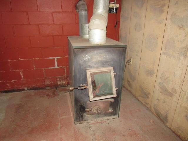 273 Odonnal Road Mill Run, PA 15464 - Photo 17 of 19 a view of a fireplace