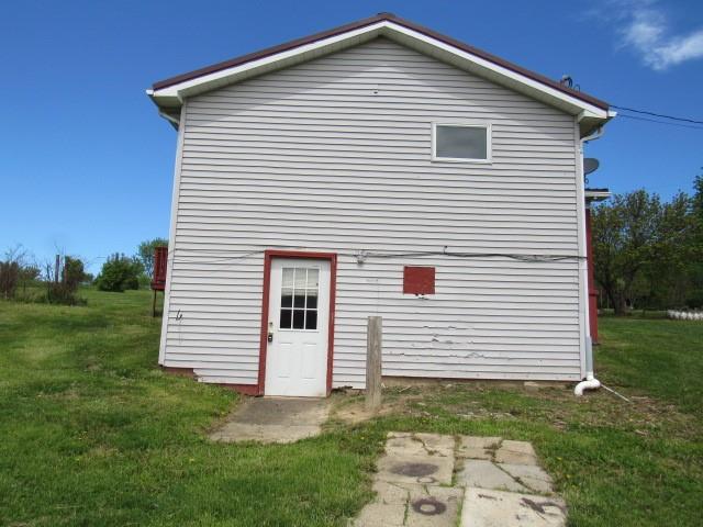 273 Odonnal Road Mill Run, PA 15464 - Photo 4 of 19 a front view of a house with a yard