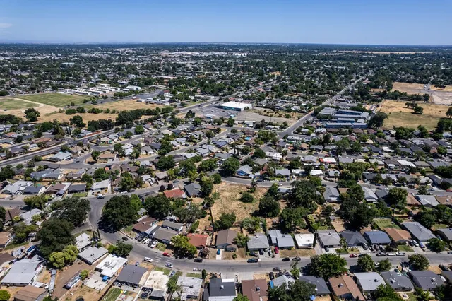 an aerial view of a city with lots of residential buildings