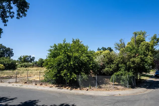 a backyard of a house with lots of green space