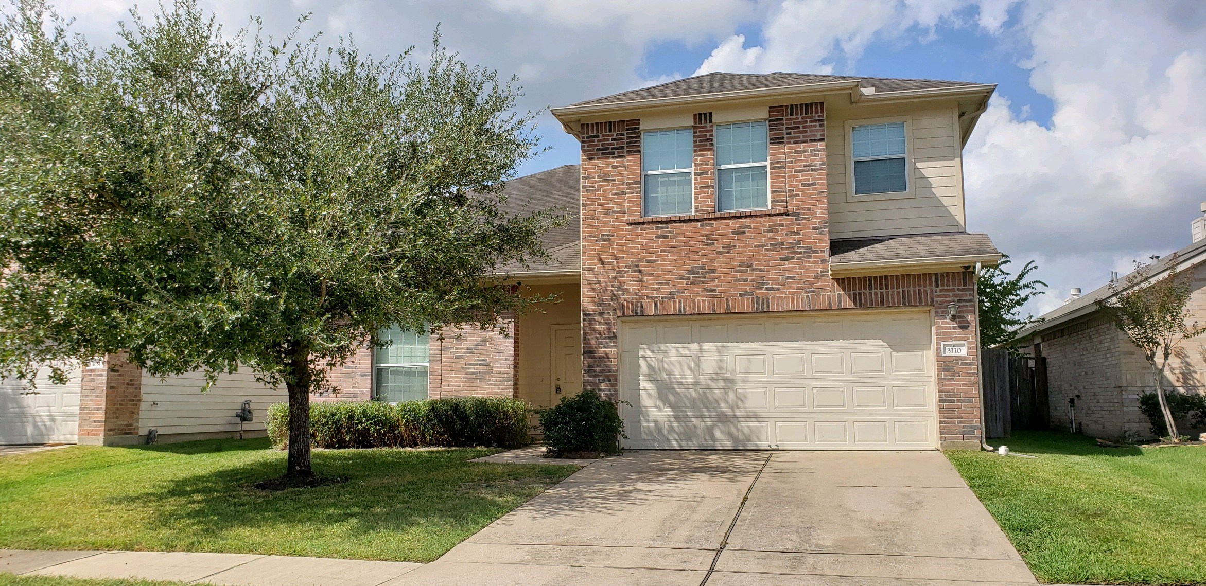 3110 Clover Ranch Circle Katy, TX 77494 - Photo 1 of 28 a front view of a house with garden