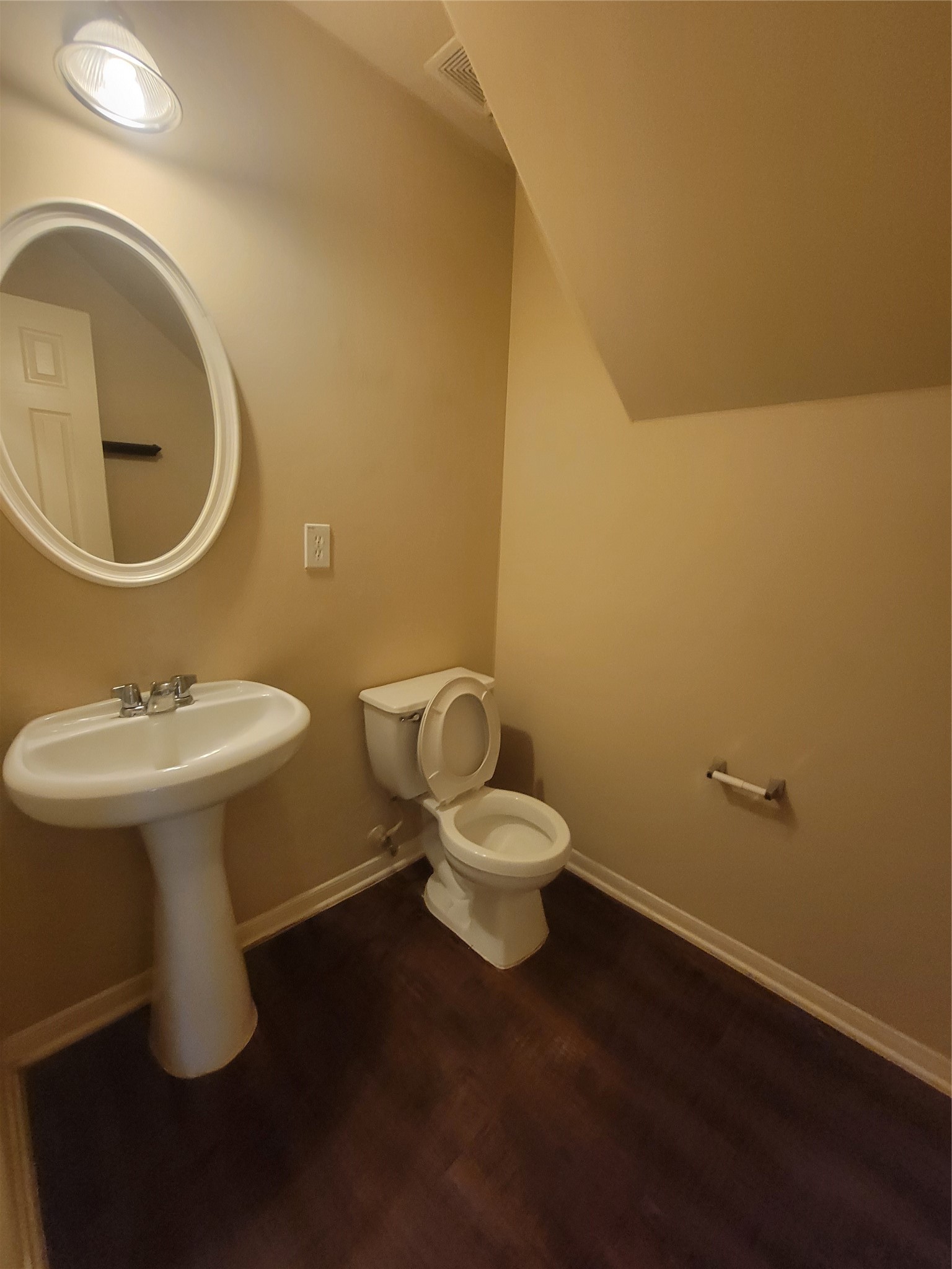 3110 Clover Ranch Circle Katy, TX 77494 - Photo 15 of 28 a white toilet sitting next to a bathroom sink