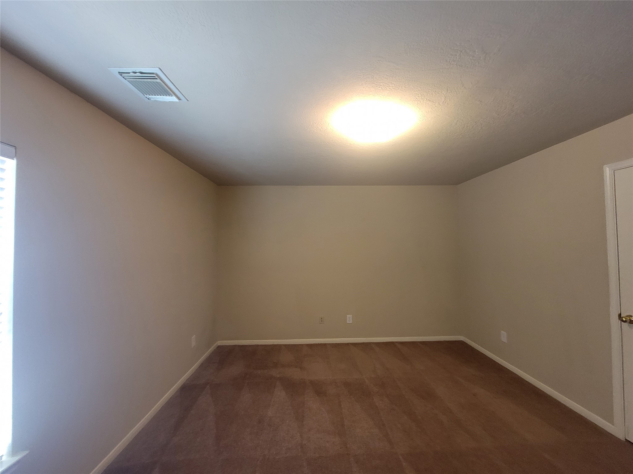 3110 Clover Ranch Circle Katy, TX 77494 - Photo 24 of 28 an empty room with a window