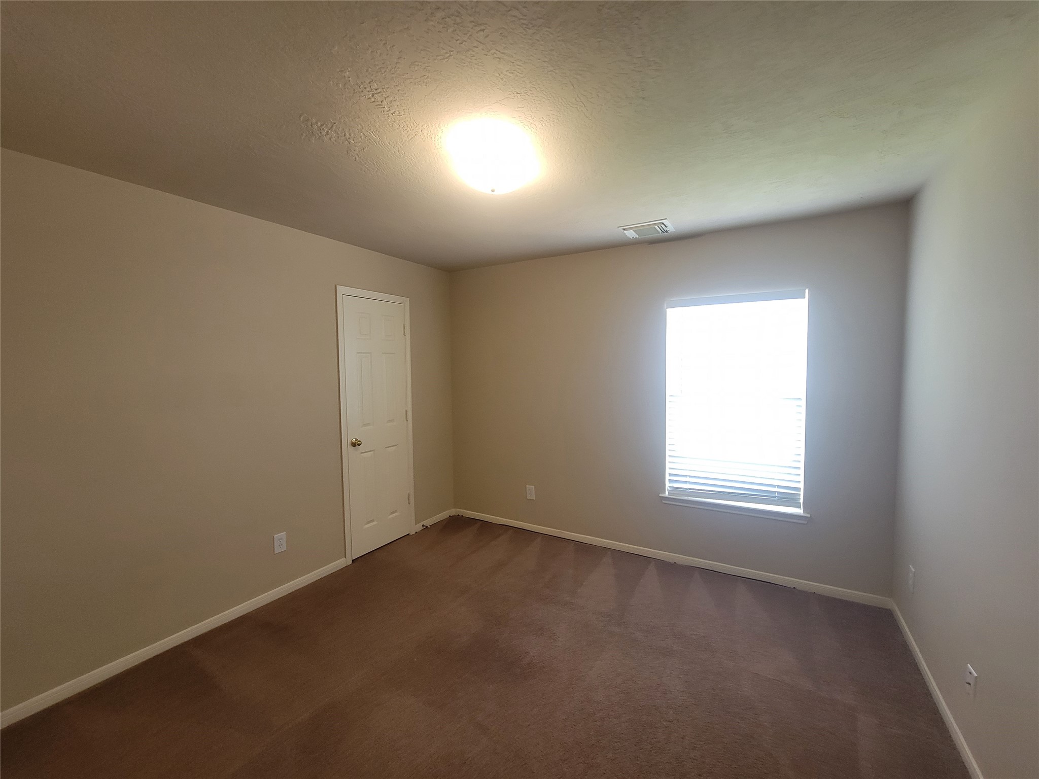 3110 Clover Ranch Circle Katy, TX 77494 - Photo 26 of 28 an empty room with a window