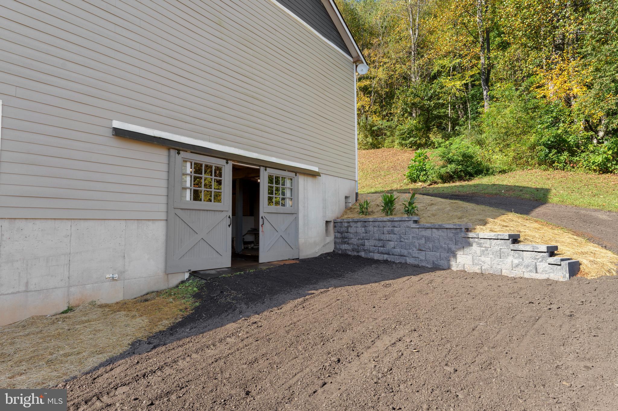 439 Rudasill Mill Road Woodville, VA 22749 - Photo 17 of 48 Hardiplank siding and poured concrete foundation