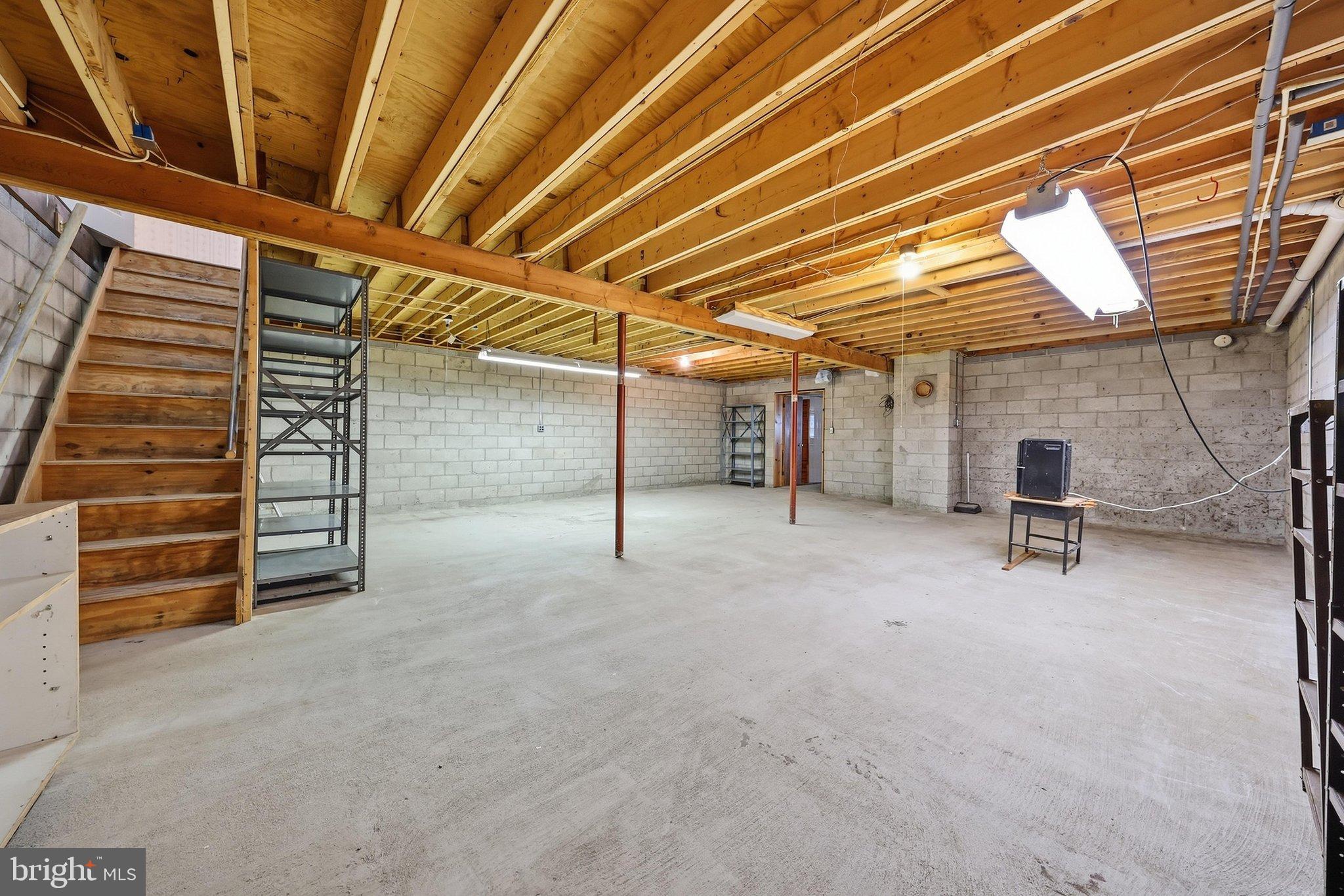 1716 Gablehammer Road Westminster, MD 21157 - Photo 39 of 52 Lower Level with Flue for Woodstove