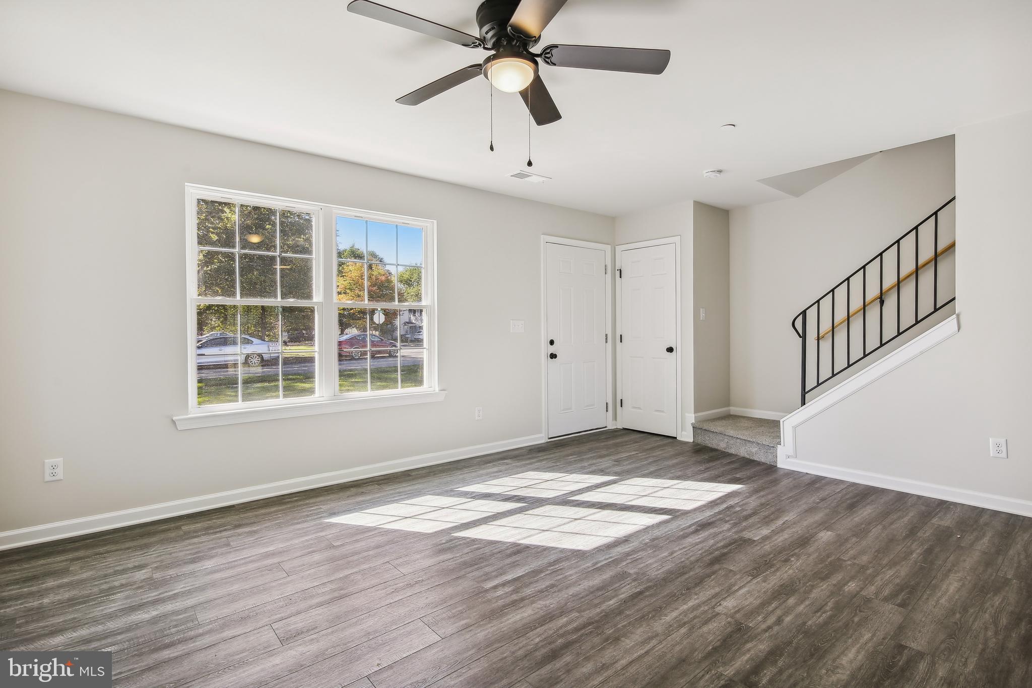 101 Metcalf Road Chestertown, MD 21620 - Photo 4 of 26 a view of an empty room with window and wooden floor