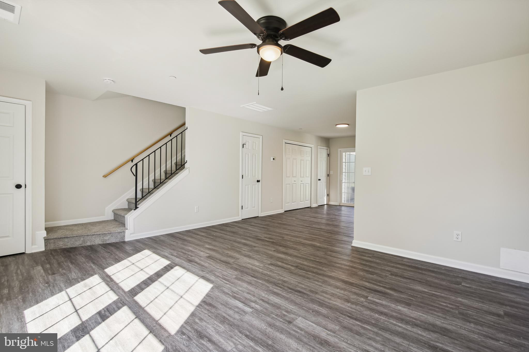 101 Metcalf Road Chestertown, MD 21620 - Photo 5 of 26 a view of empty room with wooden floor and fan