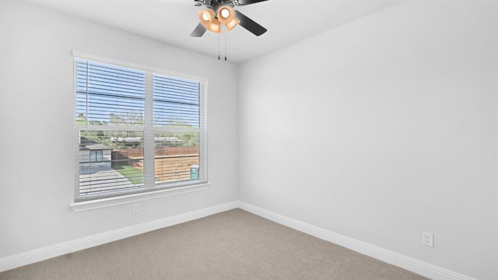 1608 Keneipp Road Carrollton, TX 75006 - Photo 10 of 13 an empty room with a window