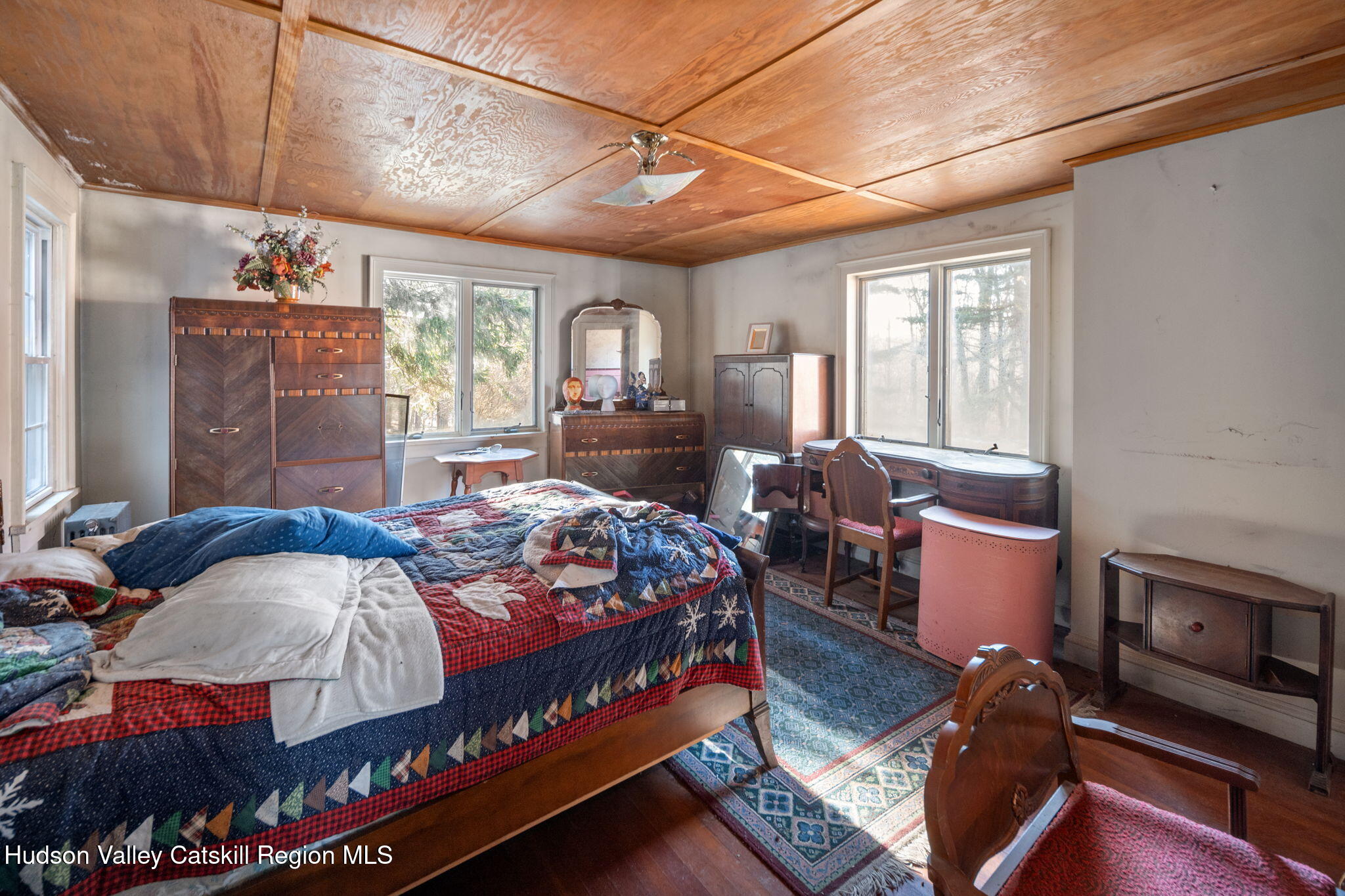 403 Blueberry Hill Road Middleburgh, NY 12122 - Photo 25 of 50 a bedroom with a bed and wooden floor