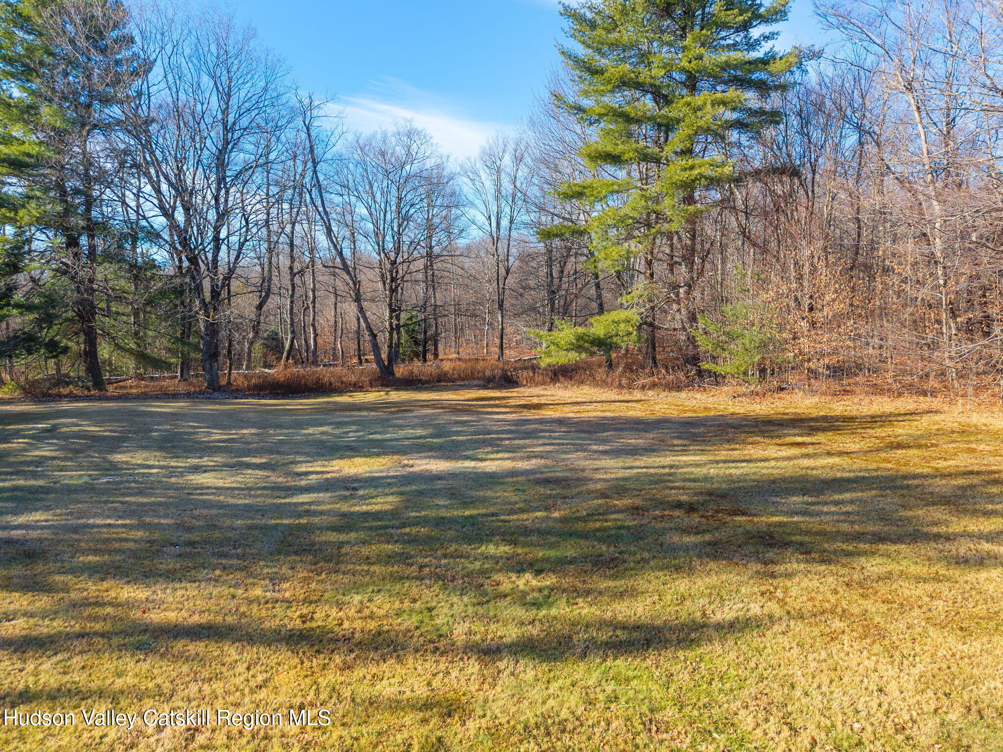 403 Blueberry Hill Road Middleburgh, NY 12122 - Photo 36 of 50 a swimming pool with an outdoor space and seating area