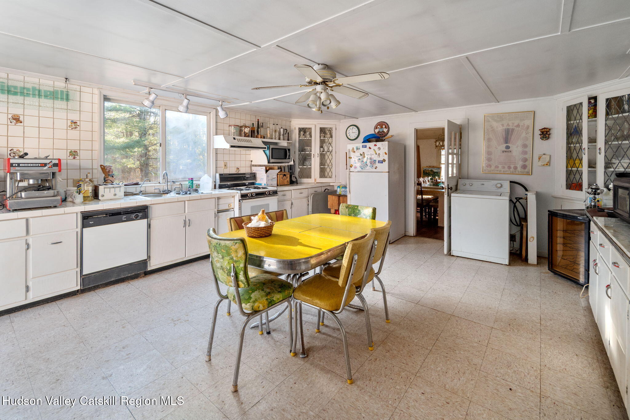 403 Blueberry Hill Road Middleburgh, NY 12122 - Photo 5 of 50 a view of a dining room with furniture a kitchen and chandelier