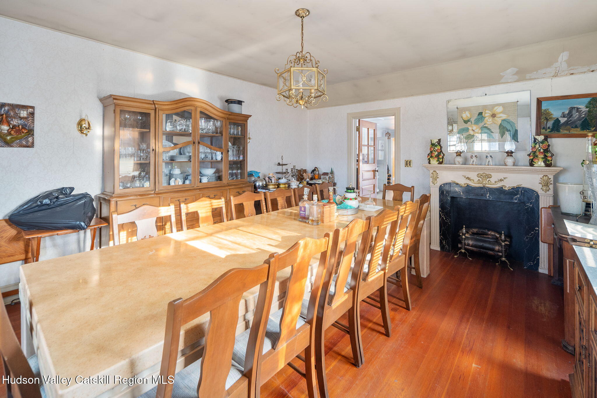 403 Blueberry Hill Road Middleburgh, NY 12122 - Photo 9 of 50 a dining room with furniture a chandelier and wooden floor